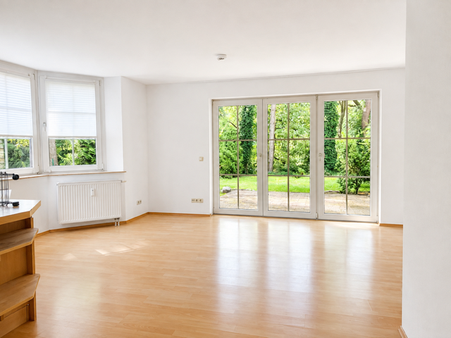 Wohnzimmer mit Küche und Erker in der Wohnung Wandlitzsee